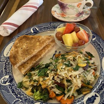 MoCo's Founding Farmers - Roasted Vegetables hash (custom menu item) with Fresh Fruit and Multigrain toast - New American Near Me - Potomac, Maryland MoCo's Founding Farmers - Roasted Vegetables hash (custom menu item) with Fresh Fruit and Multigrain toast - New American Near Me - Potomac, Maryland