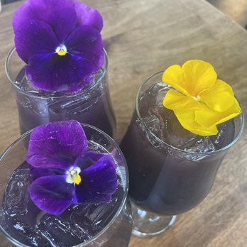 Eureka! - Charcoal Lemonade mixed with Signature Lavender Iced Tea! - American Near Me - Indian Wells, California
