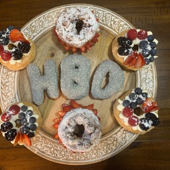 Jarams Donuts - 3 sprinkle individual donuts, 4 Cream Cheese & Mixed Berry Donuts, and 2 Nutella and Strawberry Funnel Cake donuts - Donuts Near Me - Dallas, Texas