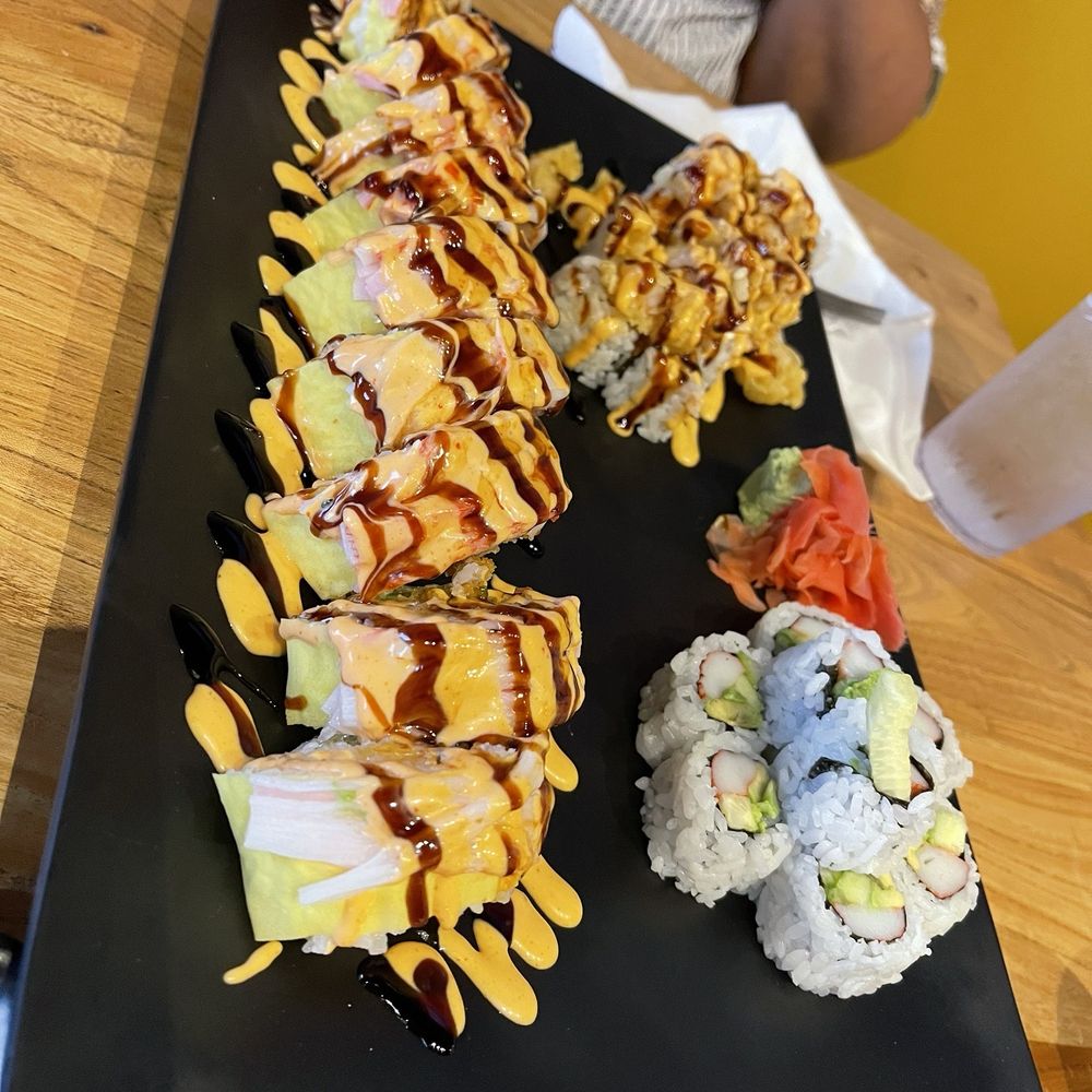 Thai Esan 2 & Mango Sushi - Big one: godfather  Top right: volcano roll Bottom right: California - Sushi Bars Near Me - Fort Oglethorpe, Georgia