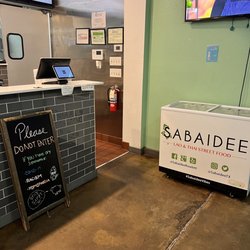 Sabaidee Lao & Thai Street Food - Rowlett - The lovely sign which draws no attention to their delicious food and instead creates an atmosphere of negativity. Bleh