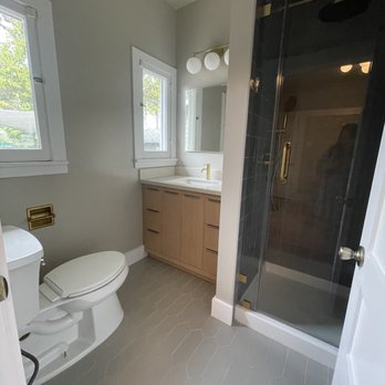 Rafu Construction - a bathroom with a toilet and shower - General Contractors Near Me - Monterey Park, California Rafu Construction - a bathroom with a toilet and shower - General Contractors Near Me - Monterey Park, California
