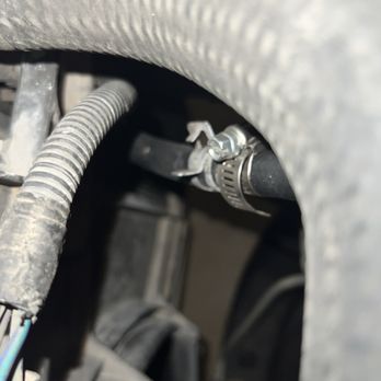 Express Oil Change & Tire Engineers - "Repaired" power steering hose with clamps - Oil Change Stations Near Me - Moore, Oklahoma