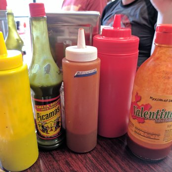 Pupuseria Mi Tierra - Sauce selection. Various green and red salsas. - Latin American Near Me - Doraville, Georgia Pupuseria Mi Tierra - Sauce selection. Various green and red salsas. - Latin American Near Me - Doraville, Georgia