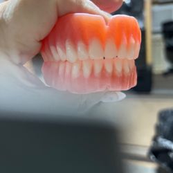 DDS Dentures + Implant Solutions