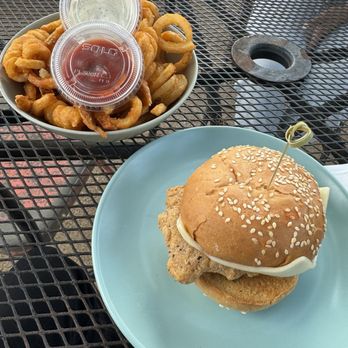 Kinda Tropical - Fried Chicken Sandwich with Curly Fries - Breakfast & Brunch Near Me - Austin, Texas Kinda Tropical - Fried Chicken Sandwich with Curly Fries - Breakfast & Brunch Near Me - Austin, Texas