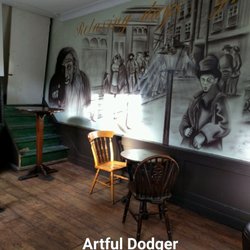 Artful Dodger - Mural on wall in back room.