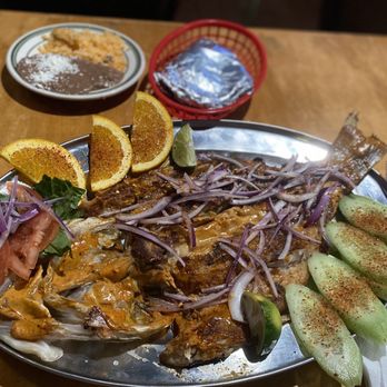 El Centenario Grill Y Seafood - Pescado Zarandeado (Served with side of rice, beans & tortillas) - Seafood Near Me - Santa Ana, California El Centenario Grill Y Seafood - Pescado Zarandeado (Served with side of rice, beans & tortillas) - Seafood Near Me - Santa Ana, California