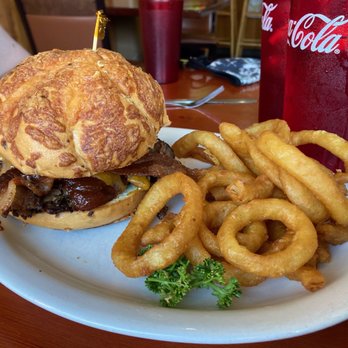 Colvins Pub & Grill - Texas Brisket with cheddar bun & onion rings - Pubs Near Me - Clatskanie, Oregon