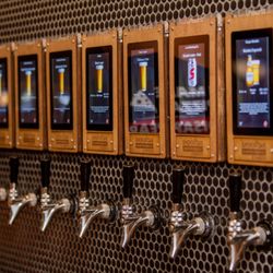 Smokin' Oak Wood-Fired Pizza & Taproom - Arkansas' first and largest self-pour taproom, where you can pour your own beer by the ounce using RFID bracelets.