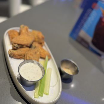 Dave & Buster's Henderson - Fried Lemon Pepper Wings - Sports Bars Near Me - Henderson, Nevada Dave & Buster's Henderson - Fried Lemon Pepper Wings - Sports Bars Near Me - Henderson, Nevada