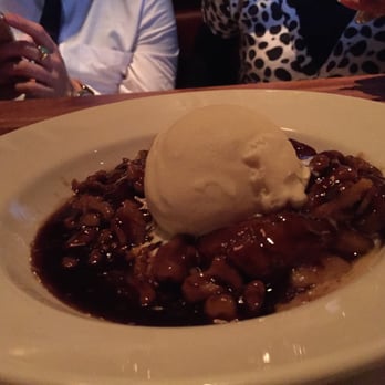 Hillstone - Hillstone: Cobbler with walnuts and ice cream that I forgot name of. - New American Near Me - San Francisco, California