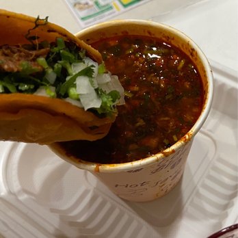 Tacos El Brother - Dipping tacos into birria - Tacos Near Me - Brooklyn, New York Tacos El Brother - Dipping tacos into birria - Tacos Near Me - Brooklyn, New York