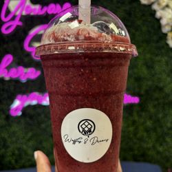 Waffles and Dreams - The berry smoothie is a vibrant blend of ripe strawberries, juicy blueberries, and tangy raspberries. Mixed with refreshing coconut water