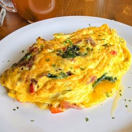 Omelet w/American, Yellow Onion, Spinach, Peppers, Pork Bacon Omelet w/American, Yellow Onion, Spinach, Peppers, Pork Bacon