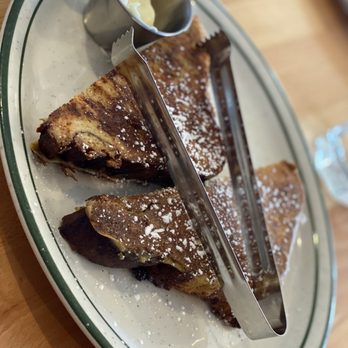 Mirabella's Table - French toast. Don't even waste your time with syrup. That white stuff is delicious on it's own! - Breakfast & Brunch Near Me - Rogers, Arkansas