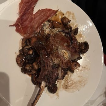 The Capital Grille - Tomahawk Veal Chop with Sage Butter, Marsala Jus and Crispy Prosciutto - Steakhouses Near Me - Houston, Texas The Capital Grille - Tomahawk Veal Chop with Sage Butter, Marsala Jus and Crispy Prosciutto - Steakhouses Near Me - Houston, Texas