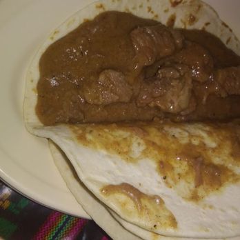 Cowgirls Cafe - Carne guisada taco on homemade flour tortillas - Mexican Near Me - San Antonio, Texas Cowgirls Cafe - Carne guisada taco on homemade flour tortillas - Mexican Near Me - San Antonio, Texas