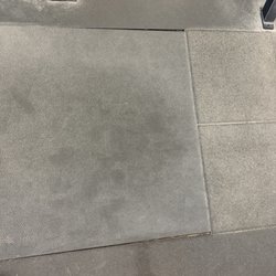 Hybrid Strength Athletics - The gap here isn't as large but the tile is obviously uneven.