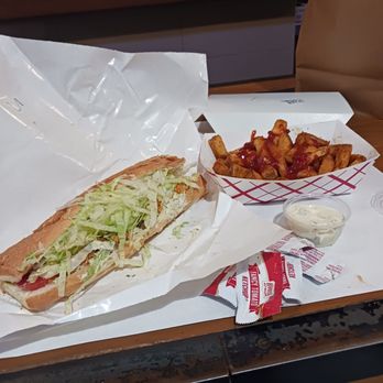 Fred's Meat & Bread - Oyster poboy and old bay seasoned fries - Burgers Near Me - Atlanta, Georgia Fred's Meat & Bread - Oyster poboy and old bay seasoned fries - Burgers Near Me - Atlanta, Georgia