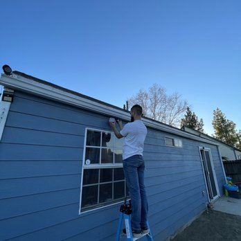 A.D Electrical - Installing 2 flood lights in back yard - Electricians Near Me