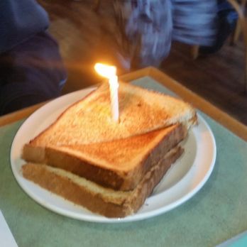 Doe Doe's Diner - Wheat toast with a birthday surprise - Breakfast & Brunch Near Me - Saint Petersburg, Florida Doe Doe's Diner - Wheat toast with a birthday surprise - Breakfast & Brunch Near Me - Saint Petersburg, Florida