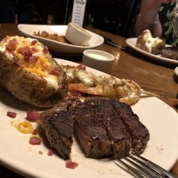 Steak & Shrimp. Bangin baked potato. Steak & Shrimp. Bangin baked potato.