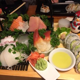 Assorted Sashimi A with House Roll. Loved the dry ice and penguin decoration! Assorted Sashimi A with House Roll. Loved the dry ice and penguin decoration!