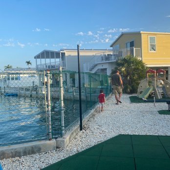 Venture Out Resort - Logan and Dennis enjoying Venture Out playground! - Resorts Near Me - Cudjoe Key, Florida Venture Out Resort - Logan and Dennis enjoying Venture Out playground! - Resorts Near Me - Cudjoe Key, Florida
