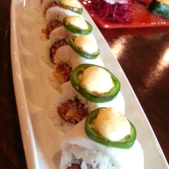 Kimoto Sake and Sushi - Snow White Roll $15 - spicy tuna & macadamia nuts. Escolar, jalapeño, and garlic mayo sauce on top - Sushi Bars Near Me - Modesto, California Kimoto Sake and Sushi - Snow White Roll $15 - spicy tuna & macadamia nuts. Escolar, jalapeño, and garlic mayo sauce on top - Sushi Bars Near Me - Modesto, California