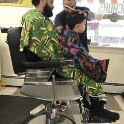 Anchors Barbershop - Irv giving my toddler a hair cut! He had cartoons on for my son.