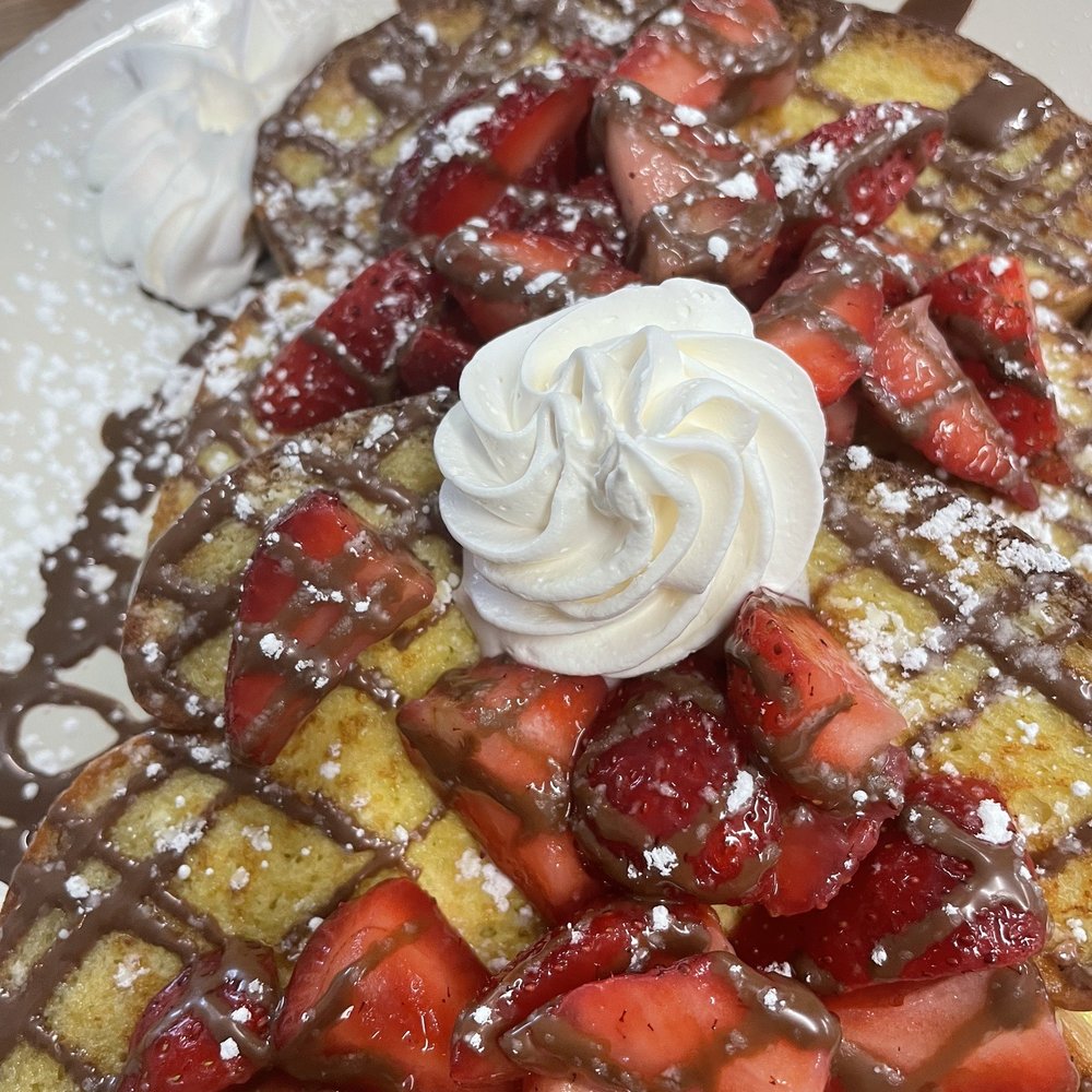Flips Pancake House - Nutella strawberry French toast - Burgers Near Me - Bettendorf, Iowa Flips Pancake House - Nutella strawberry French toast - Burgers Near Me - Bettendorf, Iowa