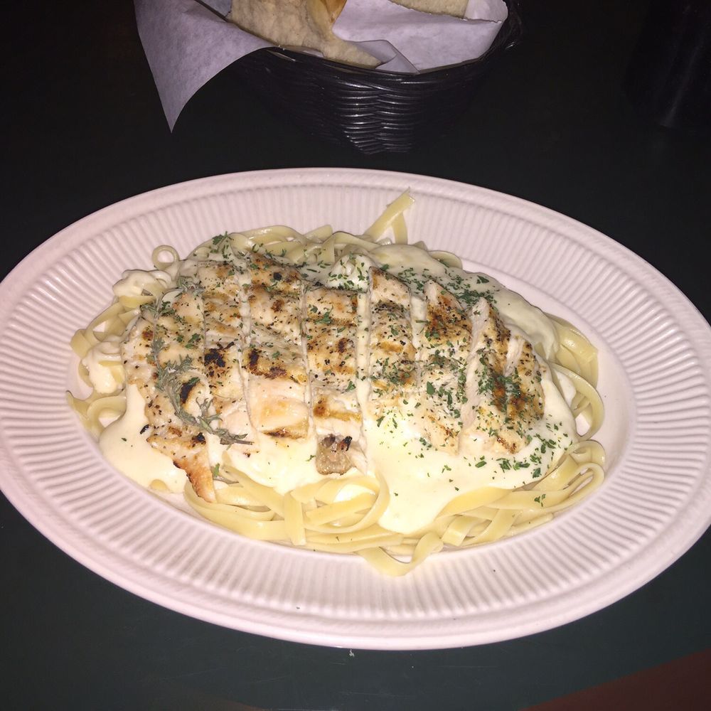 Ravello's Restaurant - Chicken Fettuccine Grilled chicken served with pasta and white sauce. - Bars Near Me - Merced, California Ravello's Restaurant - Chicken Fettuccine Grilled chicken served with pasta and white sauce. - Bars Near Me - Merced, California