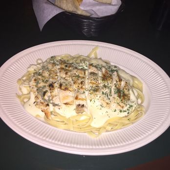 Ravello's Restaurant - Chicken Fettuccine  Grilled chicken served with pasta and white sauce. - Bars Near Me - Merced, California