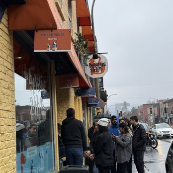 La Banquise - The line for the poutine staple in Montreal - Poutineries Near Me - Montreal, Quebec