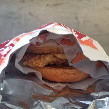 Popeyes Louisiana Kitchen - Chicken sandwich in bag - Fast Food Near Me - Darien, Illinois Popeyes Louisiana Kitchen - Chicken sandwich in bag - Fast Food Near Me - Darien, Illinois
