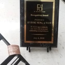 Livonia Trophy & Screenprinting - Got a lil stand for it at Michaels for $4.65!