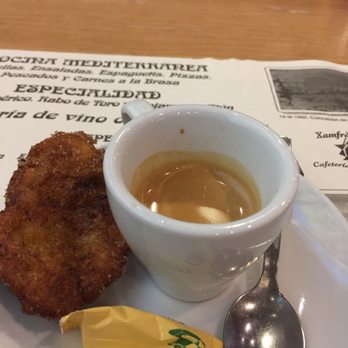 Xamfrà Gaudí - Espresso served with a piece of fried pastry - Spanish Near Me - Barcelona, B Xamfrà Gaudí - Espresso served with a piece of fried pastry - Spanish Near Me - Barcelona, B