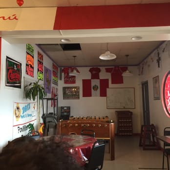 Pollito Con Papas - Little game area in the back - Peruvian Near Me - Albuquerque, New Mexico