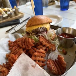 Cheeseburger and delicious sweet potato waffle fries Cheeseburger and delicious sweet potato waffle fries