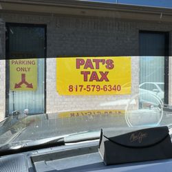 Pat's Tax - Classy signage. I should have drove off when I saw this.