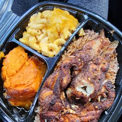 Crayven Jerk and Soul - Jerk catfish Steaks mac and cheese,  yams,  and peas and rice