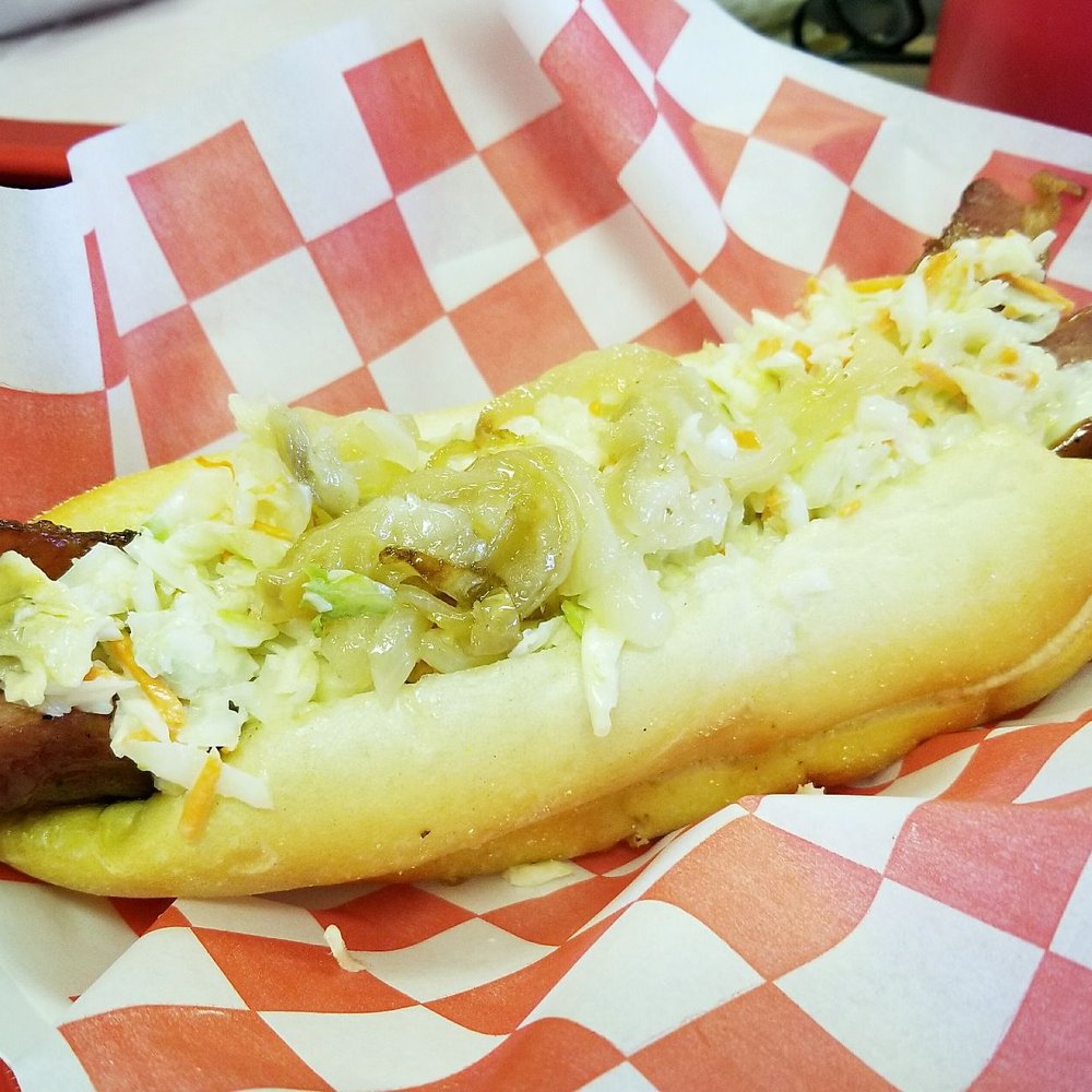 The Jersey - foot long dog with crispy bacon, American cheese, cole slaw and onions on a fresh roll. So good! The Jersey - foot long dog with crispy bacon, American cheese, cole slaw and onions on a fresh roll. So good!