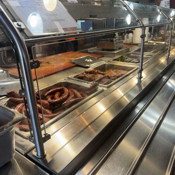 Harris County Smokehouse - Choice of meats to great you at the start of the line - Barbeque Near Me - Houston, Texas Harris County Smokehouse - Choice of meats to great you at the start of the line - Barbeque Near Me - Houston, Texas