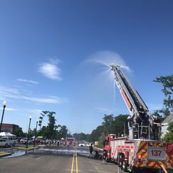 New Orleans Running Systems Road Race Management - Bring on the biggest hose - it's HOT out here