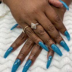 JoAnn Health and Beauty Salon - Nails that capture your desires.