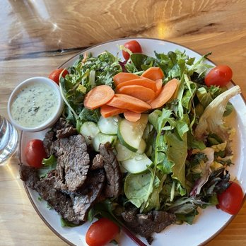 Grinning Mule Saloon and Kitchen - House Salad with Steak and Green Goddess Dressing- fresh carrots, cucumbers and sweet grape tomatoes. - Bars Near Me - Charlotte, North Carolina