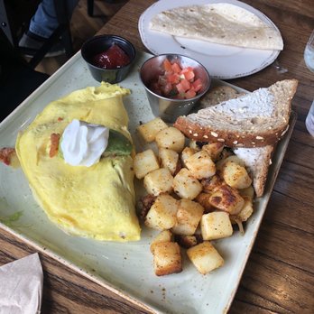 First Watch - Bacado omelet with side potatoes and toast - Cafes Near Me - Houston, Texas First Watch - Bacado omelet with side potatoes and toast - Cafes Near Me - Houston, Texas