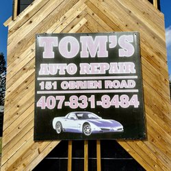 Tom's Auto Repair - New sign. New Owners. Same service.