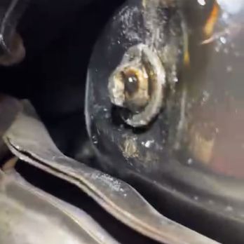 Beechmont Subaru - Oil pan dented from an overly-tightened oil cap. - Car Dealers Near Me - Cincinnati, Ohio